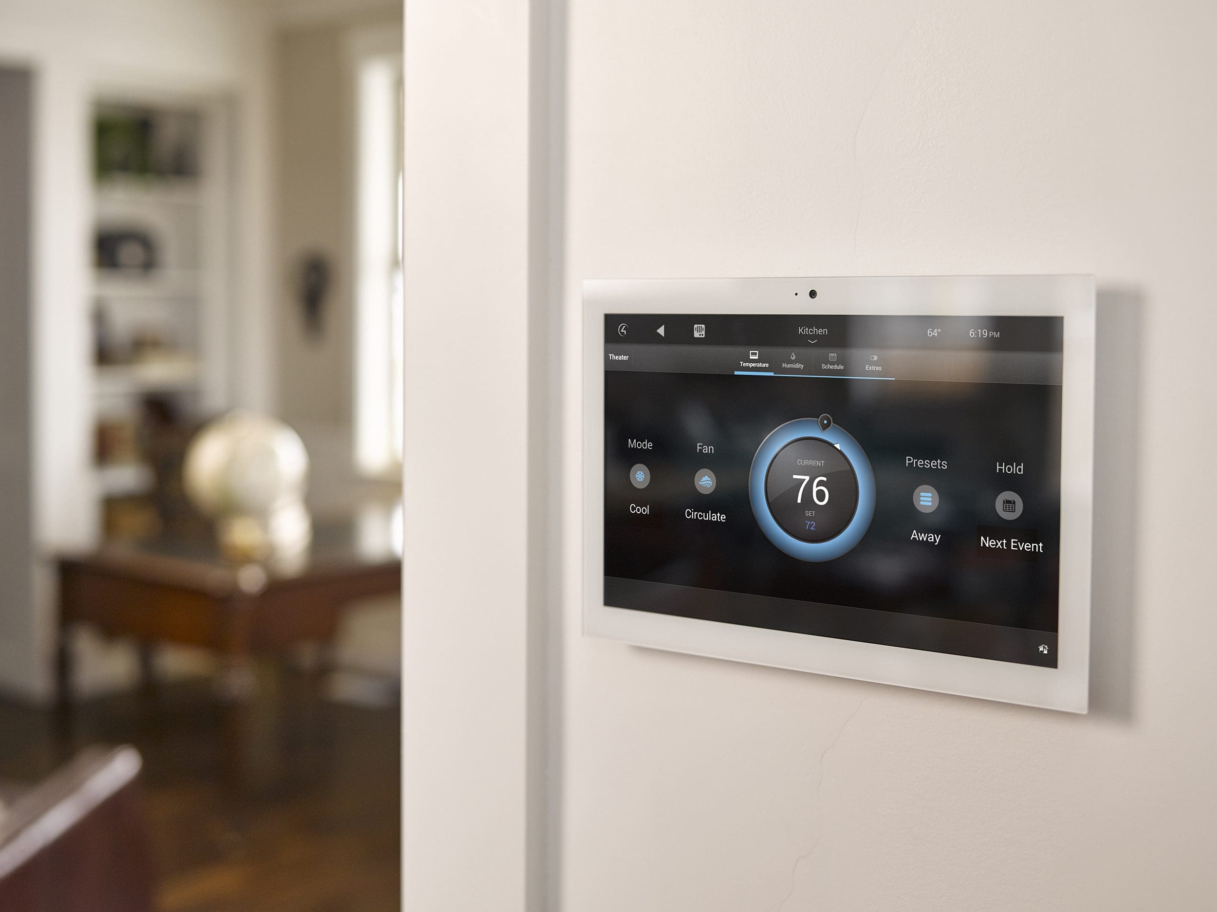 Elegant wall mount Control4 Tablet in white showing temperature control