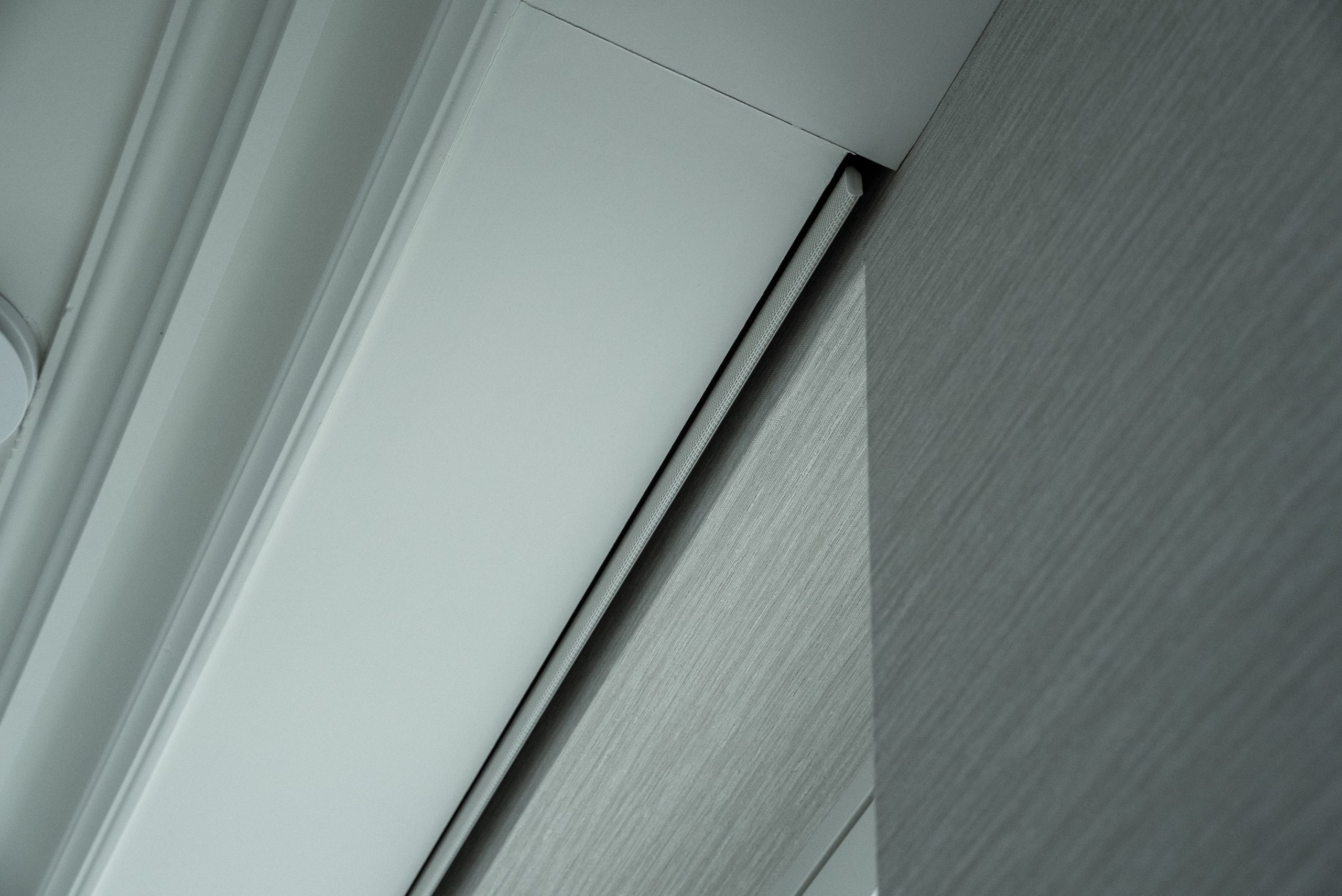 Recessed lutron blind in hidden pocket