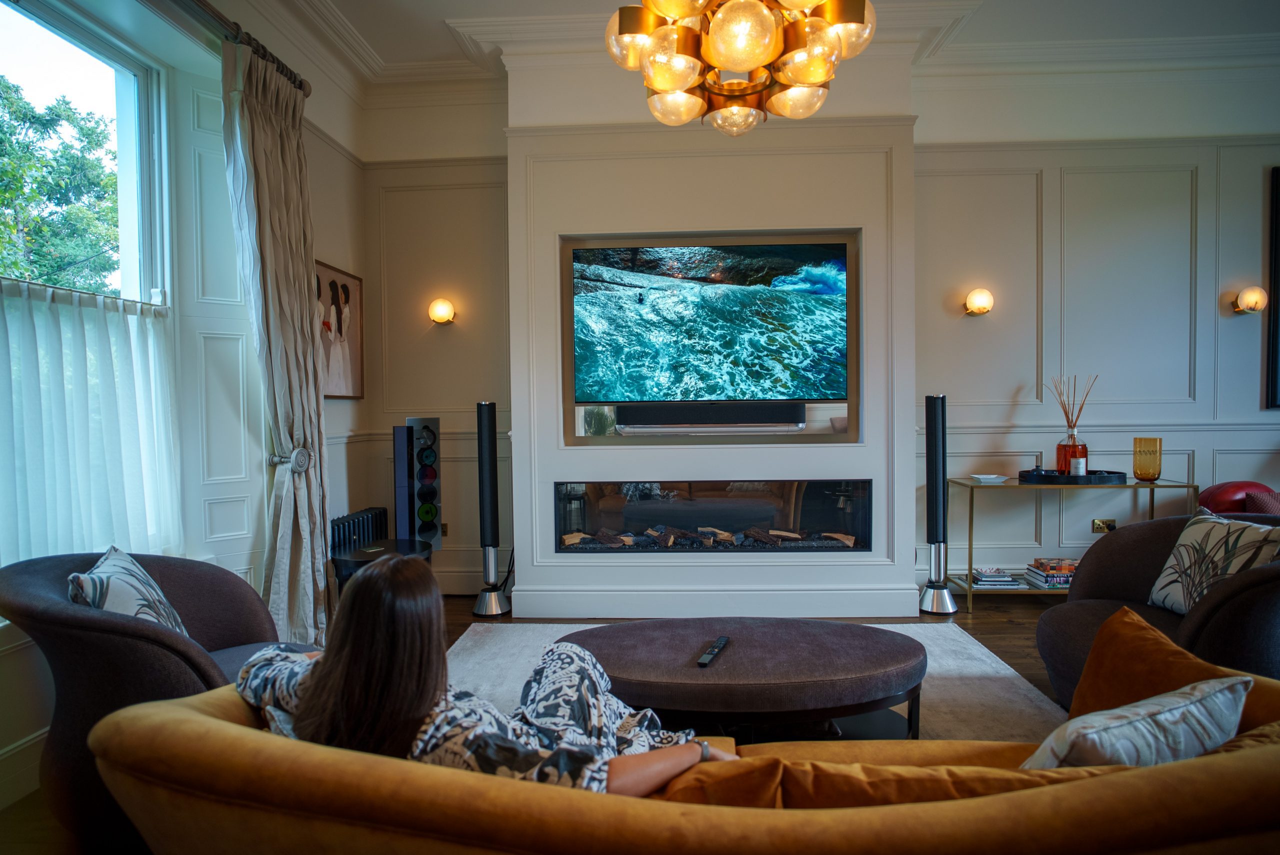 Enjoying a BeoVision Theatre with BeoLab 28 speakers as surround sound