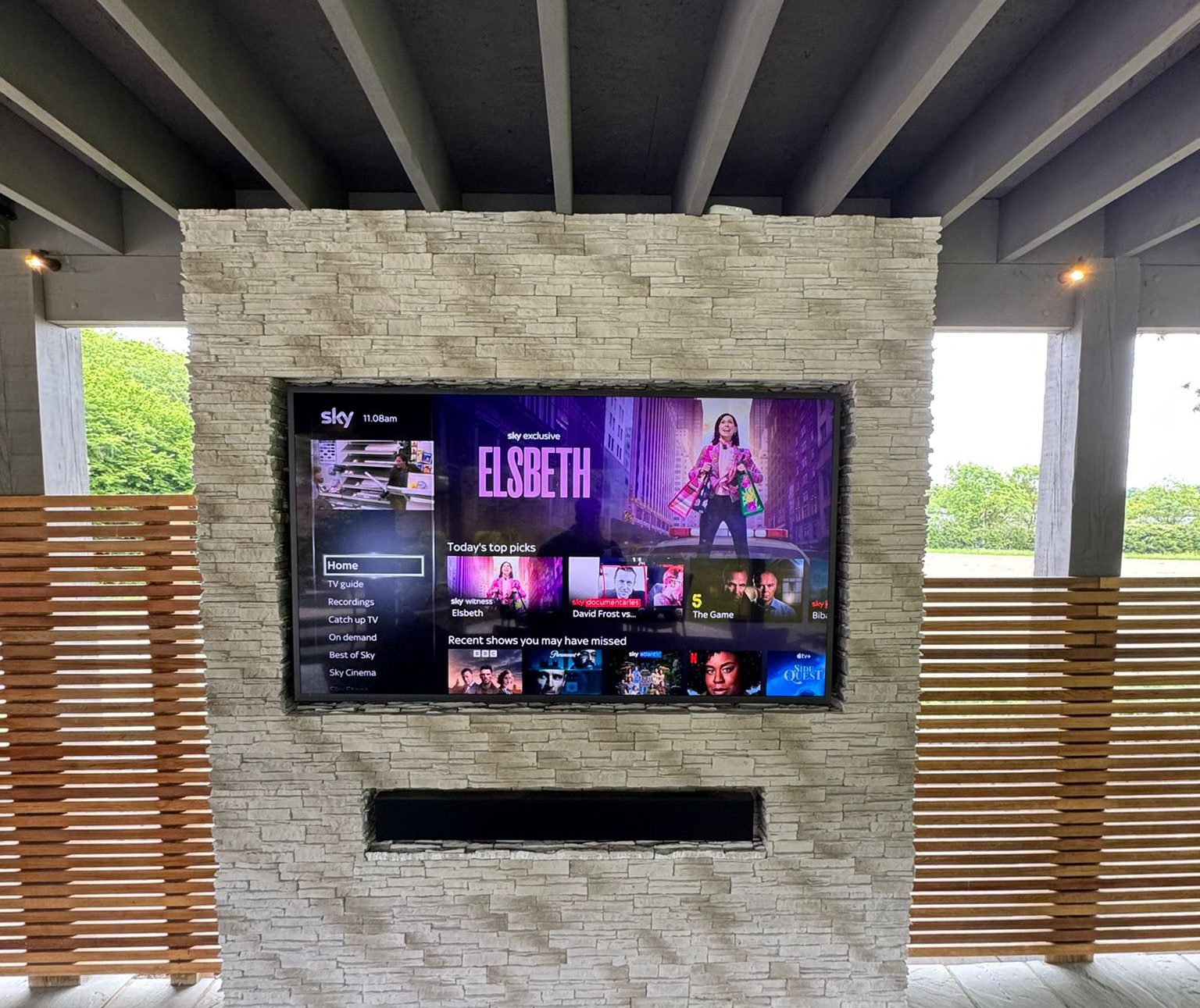 A nice example of thorough planning ahead of time for a nice recessed TV & Soundbar finish.